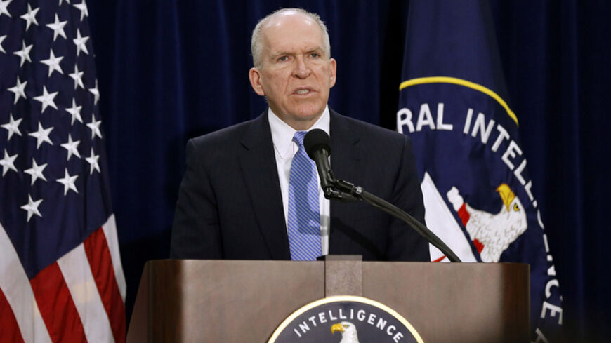 Director of the Central Intelligence Agency (CIA) John Brennan answers a reporter's question during a rare news conference at CIA Headquarters in Virginia, December 11, 2014.  Brennan said on Thursday that some agency officers used "abhorrent" interrogation techniques and said it was "unknowable" whether so-called enhanced interrogation techniques managed to get useful intelligence out of terrorism suspects.  REUTERS/Larry Downing   (UNITED STATES - Tags: POLITICS MILITARY) - RTR4HOFL