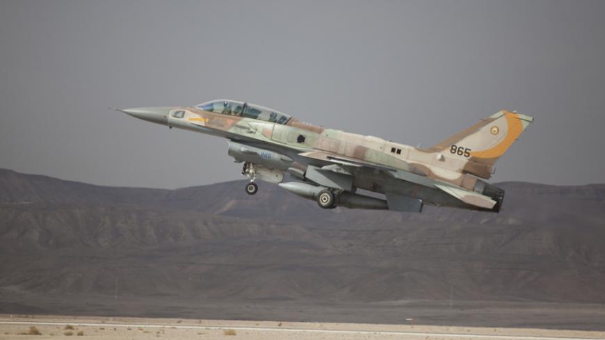 EILAT, ISRAEL - DECEMBER 09:  An Israeli F-16 jet takes off on December 9, 2014 at the Ovda airbase in the Negev Desert near Eilat, southern Israel. Israel and Greece concluded a Joint Air Forces drill during the joint IDF-Hellenic Air Force drill week. On Sunday, official Syrian media reported that Israeli jets had bombed targets near Damascus International Airport and in the town of Dimas, north of Damascus and near the border with Lebanon.  (Photo by Lior Mizrahi/Getty Images)