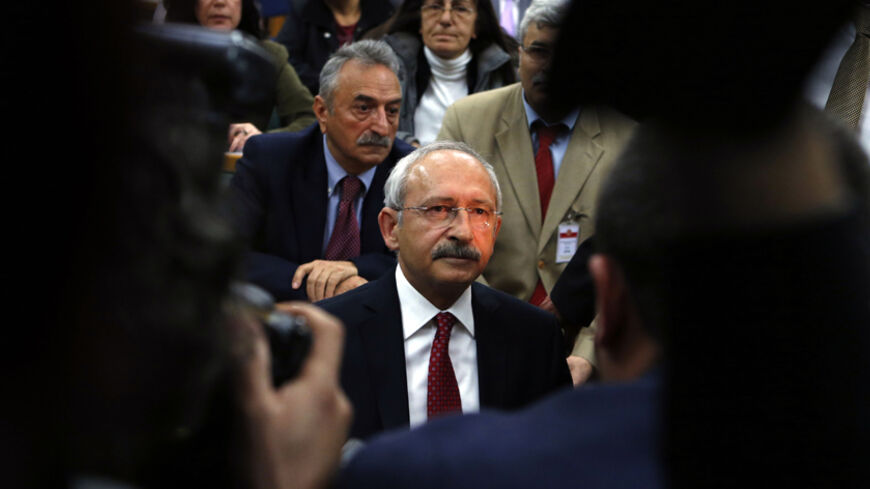 Turkey's main opposition Republican People's Party (CHP) Leader Kemal Kilicdaroglu (C) arrives for a meeting at the Turkish parliament in Ankara April 8, 2014. REUTERS/Umit Bektas (TURKEY - Tags: POLITICS) - RTR3KEBO