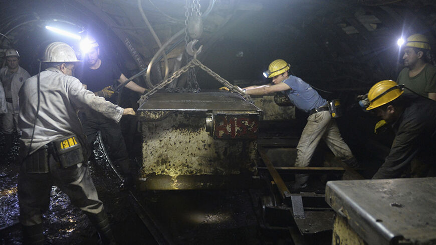 Miners work in a coal mine in the Black Sea city of Zonguldak, northern Turkey, December 5, 2013.  Turkish mining experts said the country's rules and guidelines are not as extensive as some other countries. Turkey does not even have a specific set of safety regulations for the coal industry, said Dr. H. Sebnem Duzgun, a professor with the mining engineering department of Middle East Technical University in Ankara. Yet, with safety regulators across the world increasingly adopting an approach that puts more