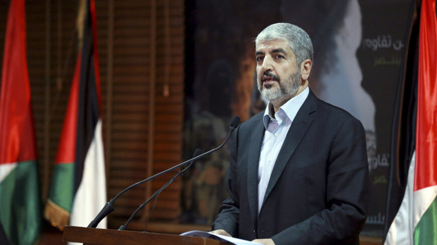 Hamas leader Khaled Meshaal talks during a news conference in Doha July 23 ,2014. Meshaal said he was ready to accept a humanitarian truce in Gaza where the Islamist group is fighting an Israeli military offensive, but would not agree to a full ceasefire until the terms had been negotiated. REUTERS/Stringer (QATAR - Tags: CIVIL UNREST MILITARY POLITICS CONFLICT) - RTR3ZVTJ