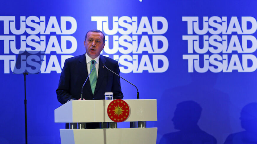 Turkish President Tayyip Erdogan addresses Turkish businessmen during a meeting of the Turkish Industry and Business Association (TUSIAD) in Istanbul September 18, 2014. Erdogan said on Thursday forecasts are for the country's gross domestic product (GDP) to expand by 3 percent this year. REUTERS/Murad Sezer (TURKEY - Tags: BUSINESS POLITICS) - RTR46PX1