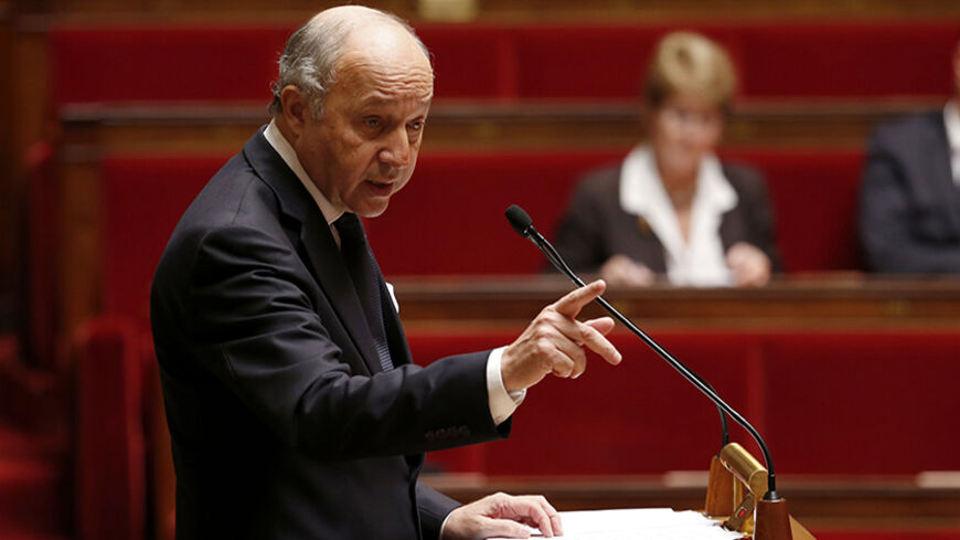 French Foreign Minister Laurent Fabius delivers a speech during a debate on Palestine status at the National Assembly in Paris November 28, 2014. French lawmakers are set to hold symbolic parliamentary votes over the next month on whether the government should recognise Palestine as a state, a move likely to anger the Jewish state. France does not classify Palestine as a state, but says it could extend recognition if it believed doing so would help promote peace between the Palestinians and Israel.      REU