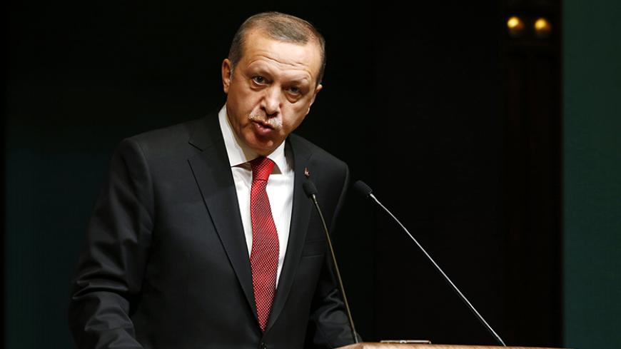 Turkey's President Tayyip Erdogan addresses the media during a news conference at the Presidential Palace in Ankara December 1, 2014. REUTERS/Umit Bektas (TURKEY - Tags: POLITICS) - RTR4GAVY