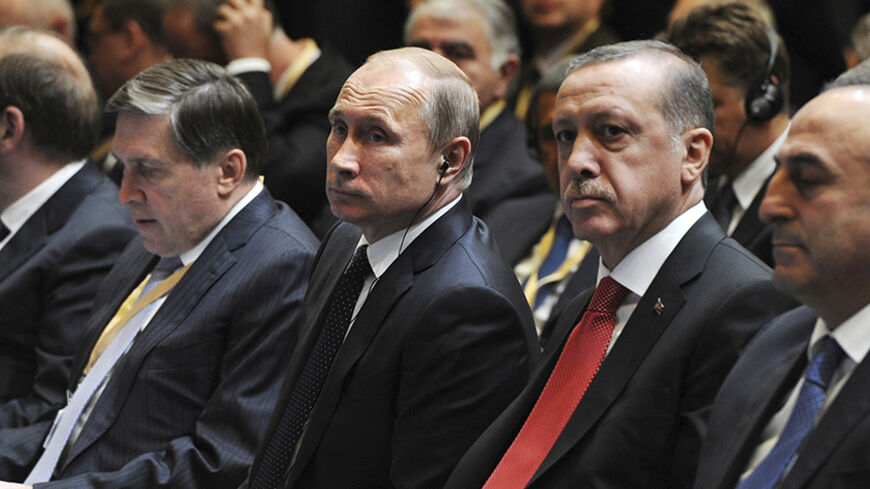 Russia's President Vladimir Putin (3rd L) and his Turkish counterpart Tayyip Erdogan (2nd L) attend a signing ceremony in Ankara, December 1, 2014. REUTERS/Mikhail Klimentyev/RIA Novosti/Kremlin (TURKEY - Tags: POLITICS) ATTENTION EDITORS - THIS IMAGE HAS BEEN SUPPLIED BY A THIRD PARTY. IT IS DISTRIBUTED, EXACTLY AS RECEIVED BY REUTERS, AS A SERVICE TO CLIENTS - RTR4GAZF