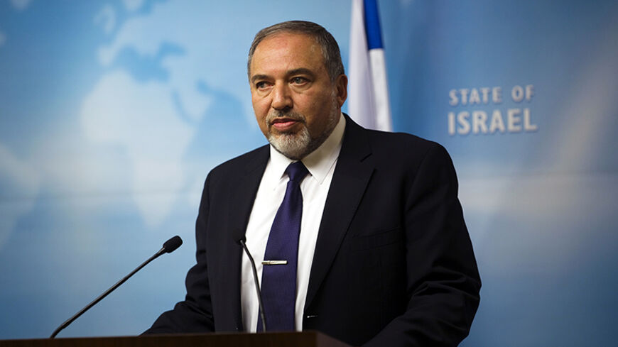 Israel's Foreign Minister Avigdor Lieberman gives a statement to the media at his Jerusalem office December 2, 2014. Israel appeared to be heading on Tuesday towards an early election after right-wing Prime Minister Benjamin Netanyahu and his major centrist coalition partner failed to patch up differences. Foreign Minister Avigdor Lieberman, head of the far-right Yisrael Beitenu party, told a news conference, "An election is a now a fact."   REUTERS/ Ronen Zvulun (JERUSALEM - Tags: POLITICS) - RTR4GEQU