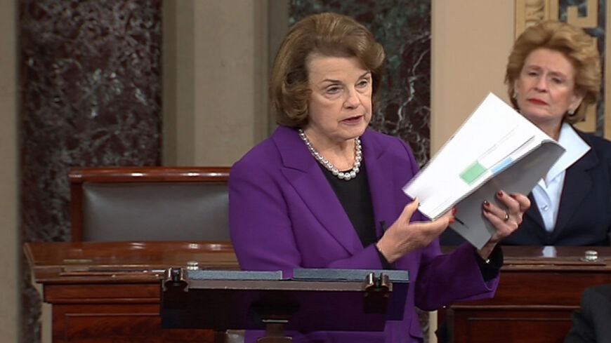 Senate Intelligence Committee Chairwoman Dianne Feinstein (D-CA) (L) discusses a newly released Intelligence Committee report on the CIA's anti-terrorism tactics, in a speech on the floor of the U.S. Senate, in this still image taken from video, on Capitol Hill in Washington December 9, 2014. "Enhanced interrogation" techniques used by the CIA on militants detained in secret prisons were ineffective and never produced information which led to the disruption of imminent terrorist plots, the declassified repo