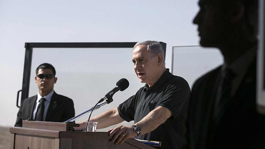 Israel's Prime minister Benjamin Netanyahu speaks during a visit to the Israeli army's training base complex near the southern city of Beersheba December 10, 2014. U.S. Secretary of State John Kerry will travel to Rome on Sunday for talks with Netanyahu on developments in Israel and the West Bank, a spokeswoman said on Wednesday.  REUTERS/Baz Ratner (ISRAEL - Tags: POLITICS MILITARY) - RTR4HHRQ