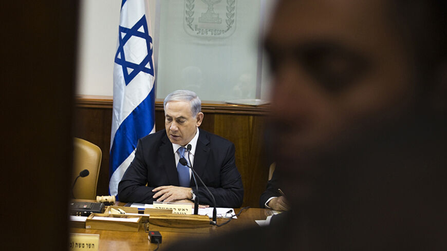 Israel's Prime Minister Benjamin Netanyahu attends the weekly cabinet meeting in Jerusalem December 21, 2014.  REUTERS/Amir Cohen (JERUSALEM - Tags: POLITICS) - RTR4IU96