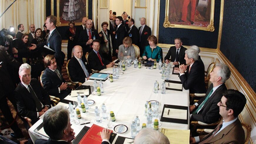 French Foreign Minister Laurent Fabius (3rd L), EU envoy Catherine Ashton (6th L), U.S. Secretary of State John Kerry (3rd R) and Britain's Foreign Secretary Philip Hammond (front L) sit a a table during talks in Vienna November 21, 2014. Iran, the United States, Britain, France, Germany, Russia and China began the final round of negotiations on a nuclear deal on Tuesday. Officials close to the talks have said the two sides are unlikely to secure a final agreement and may need to extend the negotiations.  R