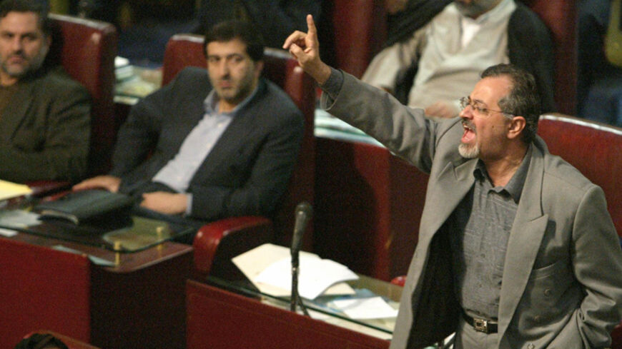 TEHRAN, IRAN:  Iranian reformist MP Ahmad Shirzad objects to the disqualifying of a large number of reformists from the upcoming legislative elections after their resignation in the parliament in Tehran, 01 February 2004. The head of Iran's main reformist party Islamic Iran Participation Front (IIPF), and brother of the president Mohammad Reza Khatami warned powerful conservatives today not to force the holding of parliament elections on February 20, saying such a step would be tantamount to a "coup d'etat"