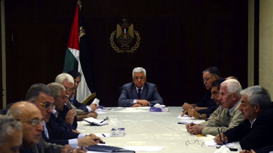 RAMALLAH, WEST BANK - JULY 13:  In this handout photo provided by the Palestinian Press Office (PPO), Palestinian President Mahmoud Abbas (C) meets with the Central Committee of the Fatah movement July 13, 2014 in Ramallah, West Bank. The total number of Palestinians killed by Israeli airstrikes on the Gaza Strip since Monday has reached 166, according to a Palestinian Health Ministry official.  (Photo by Thaer Ghanaim/PPO via Getty Images)