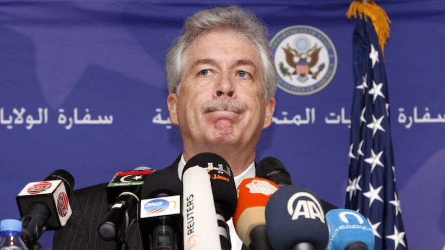 U.S. Deputy Secretary of State William Burns attends a news conference in Tripoli April 24, 2014. Burns, the most senior U.S. official to visit Libya since a deadly 2012 attack on a U.S. compound there, said on Thursday Libya was facing a severe challenge from an increase in extremist violence. REUTERS/Ismail Zitouny (LIBYA - Tags: POLITICS) - RTR3MG2I