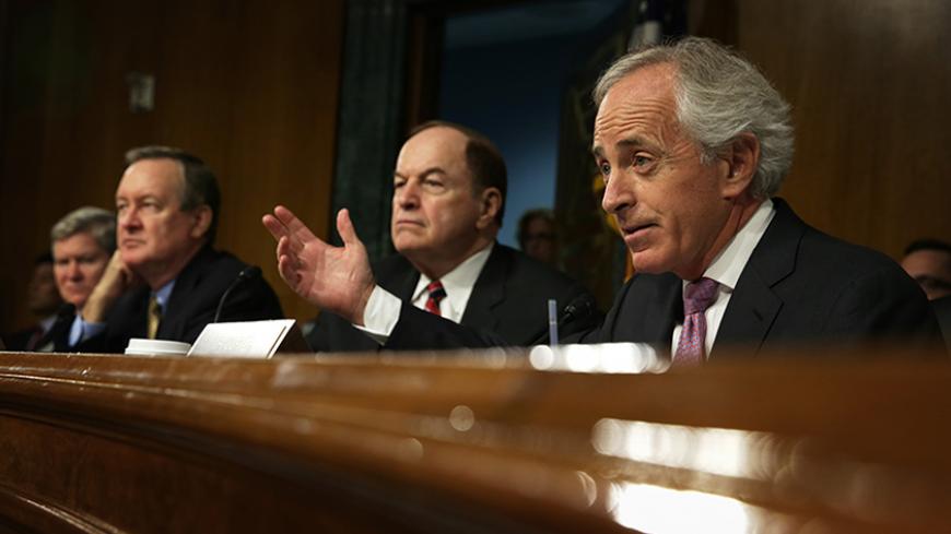 WASHINGTON, DC - NOVEMBER 14: (R-L) U.S. Sen. Bob Corker (R-TN) speaks as Sen. Richard Shelby (R-AL), committee ranking member Sen. Mike Crapo (R-ID) and committee chairman Sen. Tim Johnson (D-SD) listen during a confirmation hearing for Nominee for the Federal Reserve Board Chairman Janet Yellen (3rd L) before Senate Banking, Housing and Urban Affairs Committee November 14, 2013 on Capitol Hill in Washington, DC. Yellen will be the first woman to head the Federal Reserve if confirmed by the Senate and will