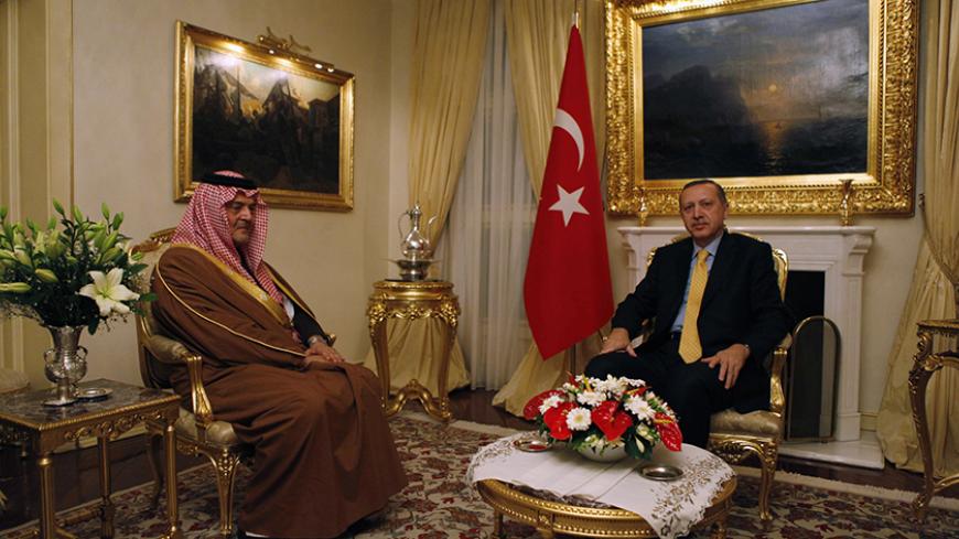 Saudi Arabia's Foreign Minister Prince Saud al-Faisal (L) meets with Turkey's Prime Minister Recep Tayyip Erdogan in Ankara March 17, 2011. REUTERS/Umit Bektas (TURKEY - Tags: POLITICS ROYALS) - RTR2K0M9