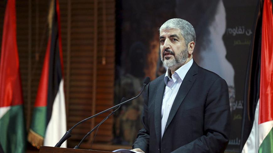 Hamas leader Khaled Meshaal talks during a news conference in Doha July 23 ,2014. Meshaal said he was ready to accept a humanitarian truce in Gaza where the Islamist group is fighting an Israeli military offensive, but would not agree to a full ceasefire until the terms had been negotiated. REUTERS/Stringer (QATAR - Tags: CIVIL UNREST MILITARY POLITICS CONFLICT) - RTR3ZVTJ