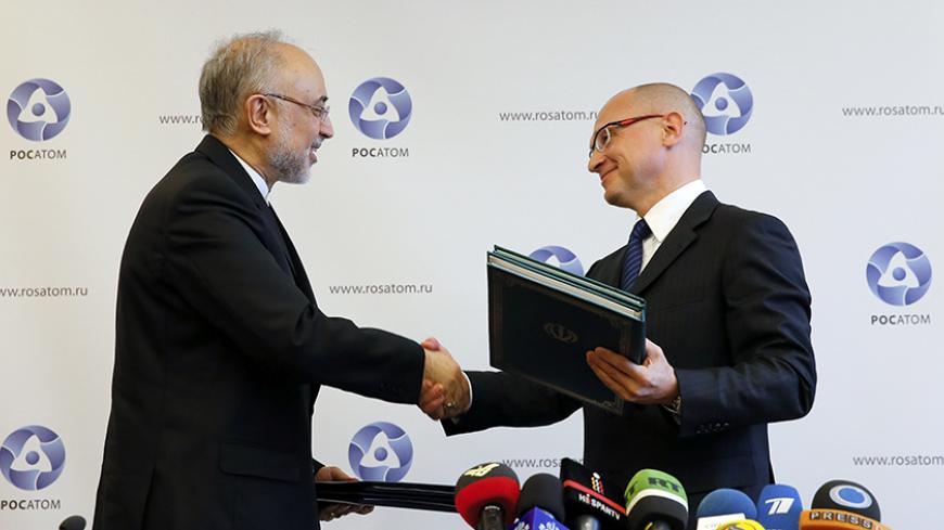 Sergei Kiriyenko (R), head of the Russian state nuclear monopoly Rosatom, and head of Iran's Atomic Energy Organisation Ali Akbar Salehi shake hands during a signing ceremony in Moscow, November 11, 2014. Russia will build two new nuclear power plant units in Iran under an agreement signed in Moscow on Tuesday. REUTERS/Maxim Shemetov (RUSSIA - Tags: POLITICS ENERGY BUSINESS) - RTR4DP59