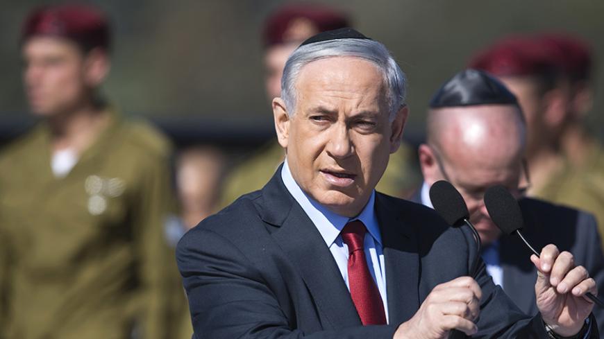 Israel's Prime Minister Benjamin Netanyahu delivers a speech during a memorial ceremony for former Prime Minister Ariel Sharon at Sycamore Ranch near the town of Sderot, marking the one-year anniversary of Sharon's death January 29, 2015. Sharon, the trailblazing warrior-statesman who stunned Arab foes with his dramatic turnarounds, died on January 11, 2014 aged 85, after eight years in a coma caused by a stroke.  REUTERS/Amir Cohen (ISRAEL - Tags: POLITICS ANNIVERSARY) - RTR4NGC7