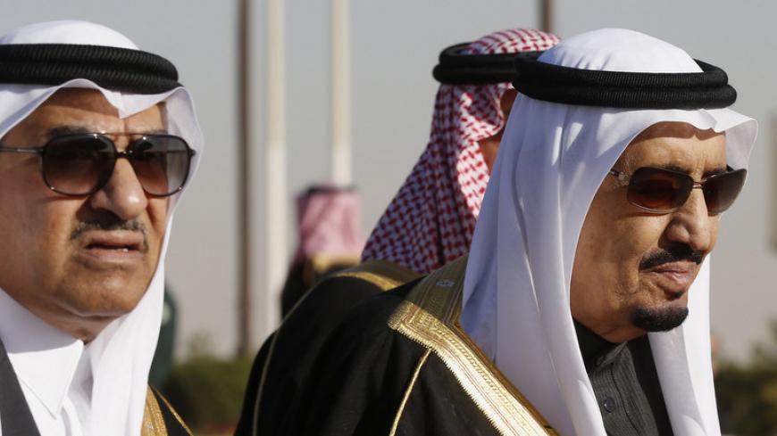 Saudi Arabia's Deputy Crown Prince Mohammed bin Nayef (L) arrives with his uncle King Salman (R) to greet U.S. President Barack Obama at King Khalid International Airport in Riyadh, January 27, 2015. King Salman's appointment of his nephew Prince Mohammed bin Nayef, 55, as Deputy Crown Prince makes him 2nd in the line of succession and he becomes the first grandson of the kingdom's founding monarch to take an established place in the line of succession. Picture taken January 27, 2015. REUTERS/Jim Bourg (SAU