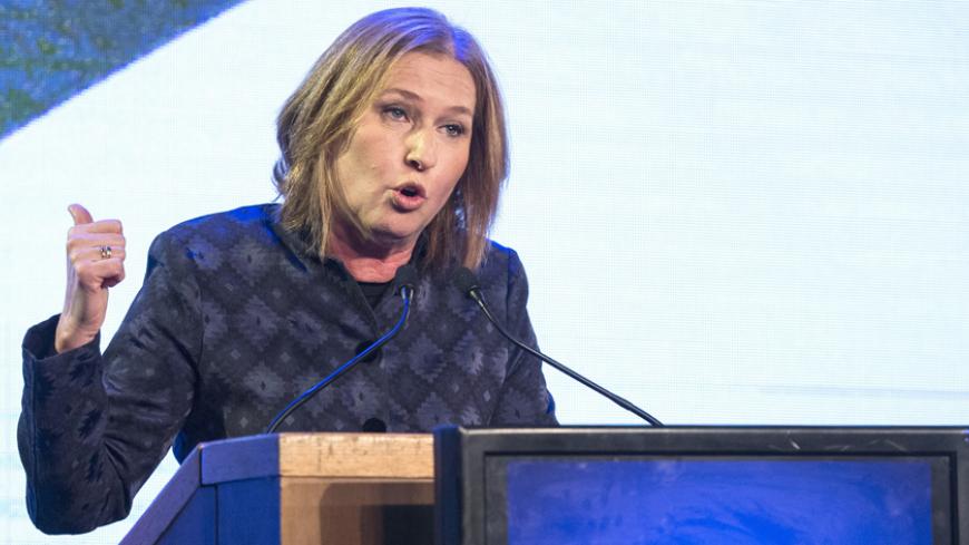 Former Israeli justice minister and HaTnuah party leader Tzipi Livni  delivers a speech election campaign meeting in Tel Aviv, on January 25, 2015 ahead of the March 17 general elections. Oposition Labour party head Isaac Herzog and Livni have made an alliance to contest Israel's snap general election. Most Israelis would like to see Prime Minister Benjamin Netanyahu replaced after March elections but, paradoxically, he is seen as most suitable for the job, an opinion poll said on December 18, 2014.  AFP PH