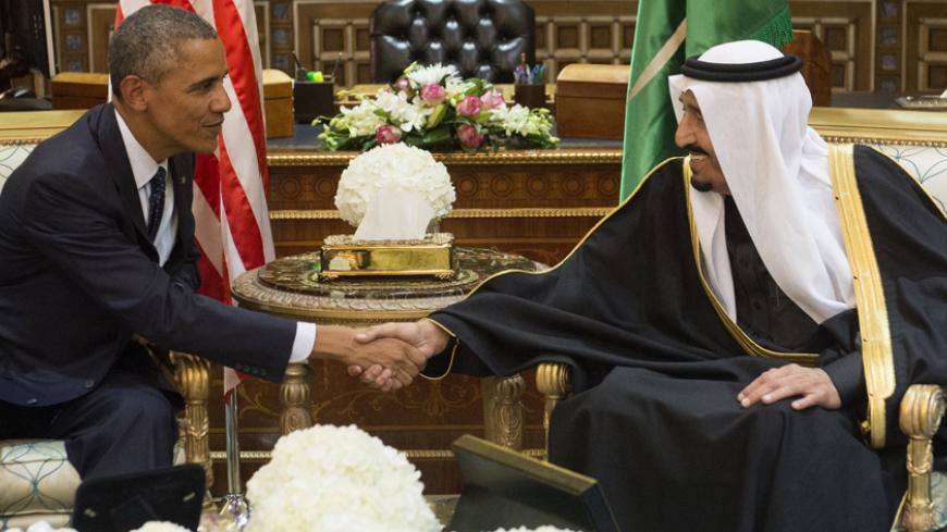 Saudi's newly appointed King Salman (R) shakes hands with US President Barack Obama at Erga Palace in Riyadh on January 27, 2015. Obama landed in Saudi Arabia with his wife First Lady Michelle Obama to shore up ties with King Salman and offer condolences after the death of his predecessor Abdullah. AFP PHOTO / SAUL LOEB        (Photo credit should read SAUL LOEB/AFP/Getty Images)
