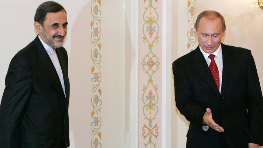 Russian President Vladimir Putin (R) welcomes Ali Akbar Velayati, former Iranian Foreign Minister, special foreign affairs envoy and a representative of Iranian Supreme Leader Ayatollah Ali Khamenei at the presidential residence in Novo-Ogaryovo outside Moscow, February 8, 2007.   REUTERS/Denis Sinyakov/Pool   (RUSSIA) - RTR1M4ZB