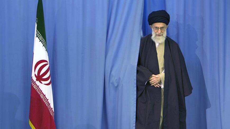 Supreme Leader Ayatollah Ali Khamenei arrives to cast his ballot in Iran's Parliamentary election in Tehran March 14, 2008. REUTERS/Caren Firouz  (IRAN) - RTR1Y9QC