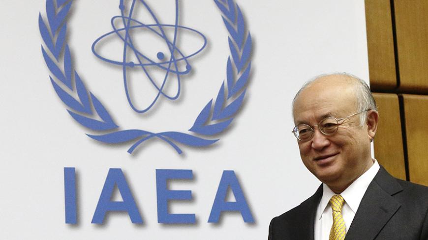 International Atomic Energy Agency (IAEA) director general Yukiya Amano arrives for a board of governors meeting at the IAEA headquarters in Vienna December 11, 2014. The head of the U.N. atomic agency asked member states on Thursday for 4.6 million euros ($5.7 million) in extra funding "as soon as possible" to help pay for its monitoring of an extended nuclear deal between Iran and six world powers. Iran and the United States, France, Germany, Britain, China and Russia failed last month to meet a self-impo