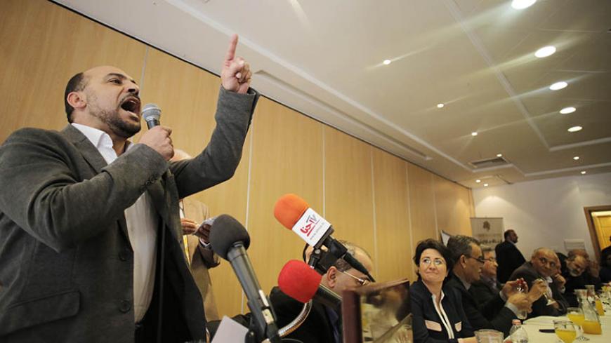 Parliament member Masoud Ghanem speaks at a news conference held by Arab-Israeli parliament members and other candidates, announcing a joint political slate of all the Arab parties which will be running in the upcoming elections, in the northern city of Nazareth, January 23, 2015. Four political parties that mostly represent Israel's Arab minority have decided to run together in elections on March 17, creating a potential counter-weight to Prime Minister Benjamin Netanyahu and his right-wing allies. Opinion