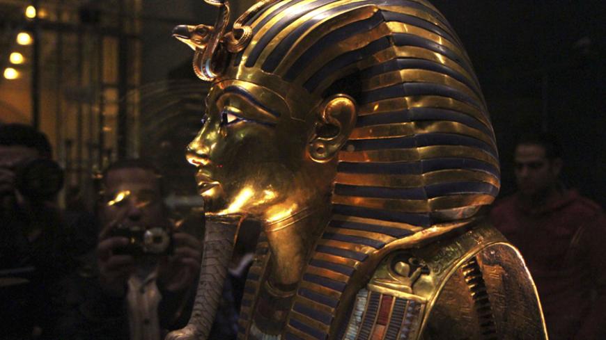 The golden mask of Pharaoh Tutankhamen is seen on display at the Egyptian Museum in Cairo, January 24, 2015. The Egyptian Museum in Cairo acknowledged on Saturday that one of its greatest treasures, the mask of King Tutankhamun, had been crudely glued back together after being damaged, but insisted the item could be restored to its former glory. The golden mask's beard was detached in August, something the museum had not made public until photographs surfaced on the Internet showing a line of glue around it