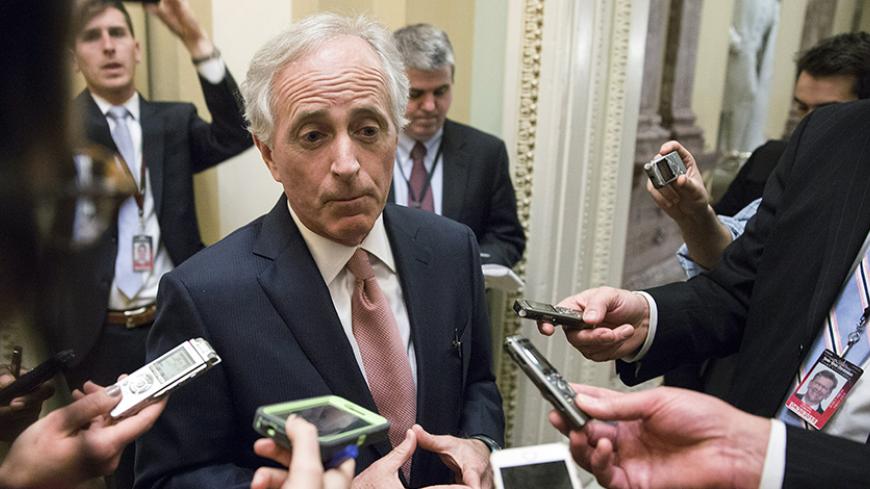 Chairman of the Senate Foreign Relations Committee Senator Bob Corker (R-TN) speaks to reporters about U.S. President Barack Obama's request to authorize military force against Islamic State, on Capitol Hill in Washington February 11, 2015.      REUTERS/Joshua Roberts    (UNITED STATES - Tags: POLITICS MILITARY CIVIL UNREST) - RTR4P8CN