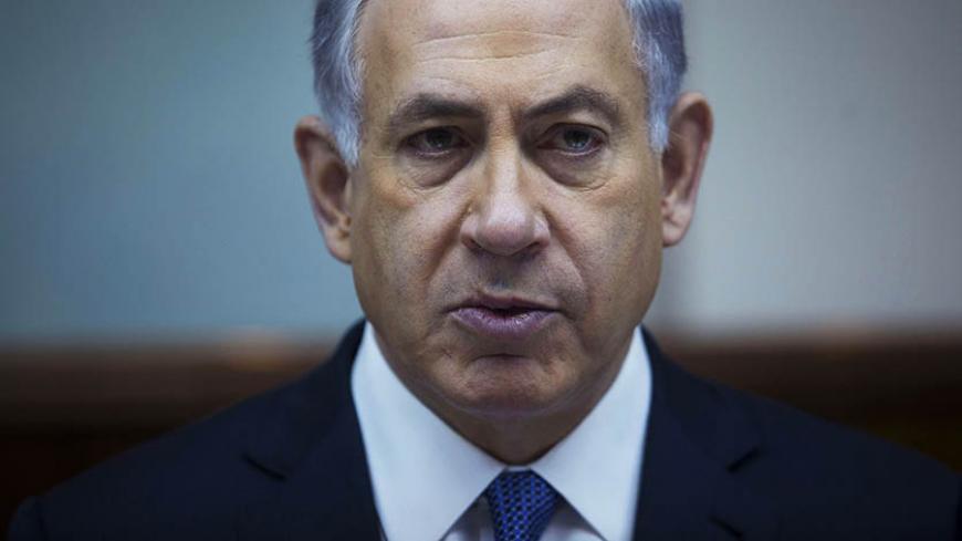 Israel's Prime Minister Benjamin Netanyahu attends the weekly cabinet meeting at his office in Jerusalem February 15, 2015.  Netanyahu, who is due to address the U.S. Congress on Iran on March 3 - to the annoyance of the Obama administration - has vowed "to foil this bad and dangerous agreement." REUTERS/Abir Sultan/Pool    (JERUSALEM - Tags: POLITICS) - RTR4PN1Y