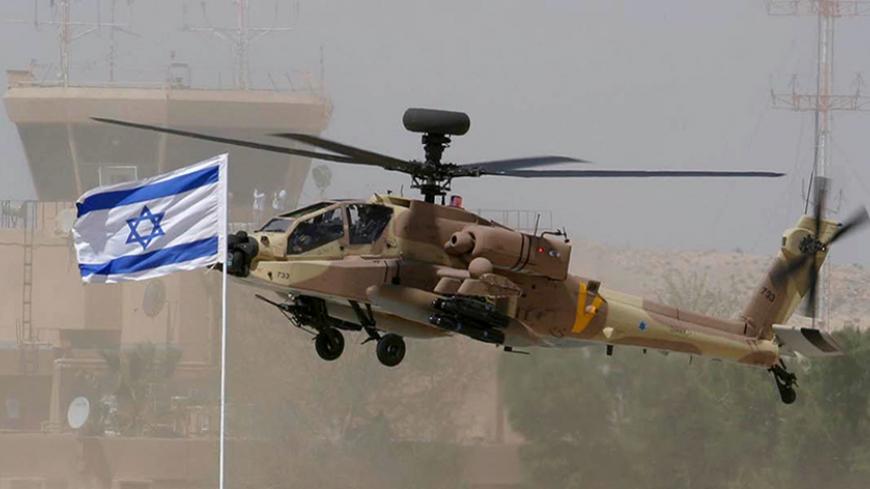 A US-made Apache Longbow helicopter flies in front of a control tower at Ramon Air Base in southern Israel.  A U.S.-made Apache Longbow helicopter flies in front of a control tower during a presentation to the media at the Israeli Ramon Air Base in southern Israel April 10, 2005. REUTERS/Pawel Wolberg/Pool - RTR7PVR