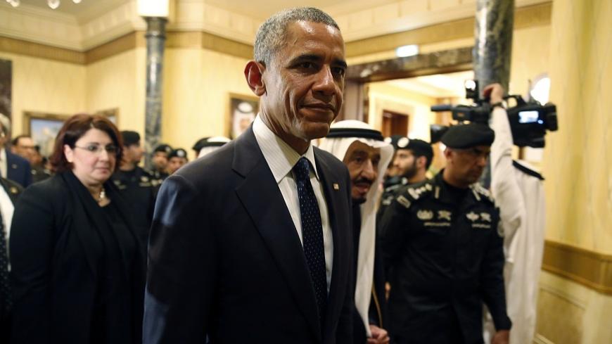U.S. President Barack Obama walks with Saudi Arabia's King Salman (C) at Erga Palace in Riyadh January 27, 2015. Obama sought to cement ties with Saudi Arabia as he came to pay his respects on Tuesday after the death of King Abdullah, a trip that underscores the importance of a U.S.-Saudi alliance that extends beyond oil interests to regional security. REUTERS/Jim Bourg (SAUDI ARABIA - Tags: POLITICS) - RTR4N5P2