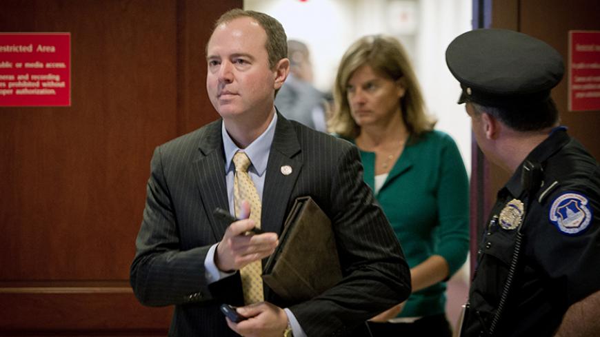 Rep. Adam Schiff (D-CA) leaves the room after a hearing at the US Capitol on November 16, 2012 in Washington,DC. Ex-CIA chief David Petraeus began his testimony before lawmakers Friday about the September 11 assault on the US mission in Benghazi, his first appearance since resigning suddenly a week ago. Packs of reporters and camera crews were on hand at the US Capitol hoping to catch Petraeus entering the highly-anticipated, closed-door hearing of the House Intelligence Committee but they were left disappo