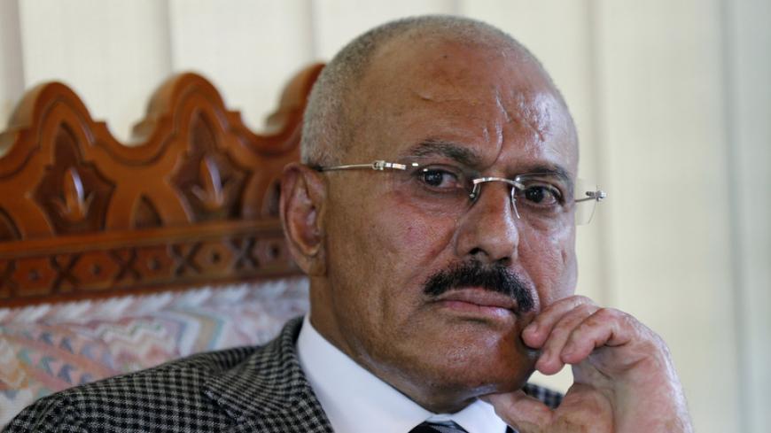Yemen's former President Ali Abdullah Saleh pauses during an interview with Reuters in Sanaa May 21, 2014. Other Yemeni officials may have looted public funds, but Saleh says he was not one of them and he has challenged his authorities to find one dollar acquired inappropriately and hold him to account. His critics in Yemen, an impoverished country of 25 million where 40 percent of the population live on less than $2 per day, accuse him of embezzling billions of dollars during his 33 years in power. Picture