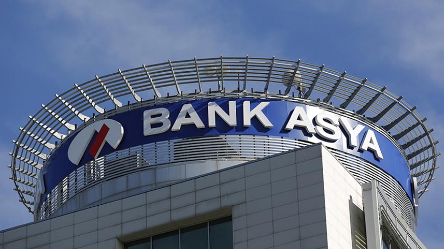Bank Asya headquarters is pictured in Istanbul February 4, 2015. Turkey has taken control of Bank Asya, the Islamic lender caught up in a feud between President Tayyip Erdogan and his ally-turned-foe, U.S.-based Muslim cleric Fethullah Gulen. The action by Turkey's banking regulatory authorities follows a run on deposits at Bank Asya last year when the lender became embroiled in the power struggle between Erdogan and Gulen, whose followers had set up the bank. REUTERS/Murad Sezer (TURKEY - Tags: BUSINESS LO