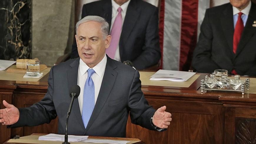 Israeli Prime Minister Benjamin Netanyahu addresses a joint meeting of Congress in the House Chamber on Capitol Hill in Washington, March 3, 2015. U.S. Speaker of the House John Boehner (L) (R-OH) and President pro tempore of the U.S. Senate Orrin Hatch (R-UT) look on from behind Netanyahu.  REUTERS/Gary Cameron (UNITED STATES  - Tags: POLITICS)   - RTR4RWHE