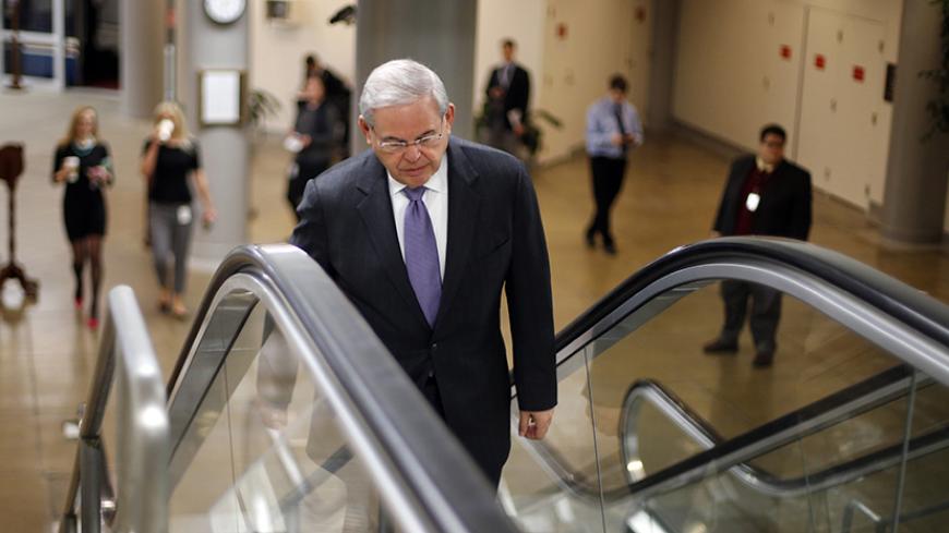 U.S. Senator Robert Menendez (D-NJ) arrives for a vote on whether to overturn a presidential veto of the Keystone XL pipeline, at the U.S. Capitol in Washington, March 4, 2015. The U.S. Senate failed on Wednesday to overturn Obama's veto of legislation approving the Keystone XL oil pipeline, leaving the contentious project to await an administration decision on whether to allow it. REUTERS/Jonathan Ernst    (UNITED STATES - Tags: POLITICS ENERGY ENVIRONMENT) - RTR4S47R