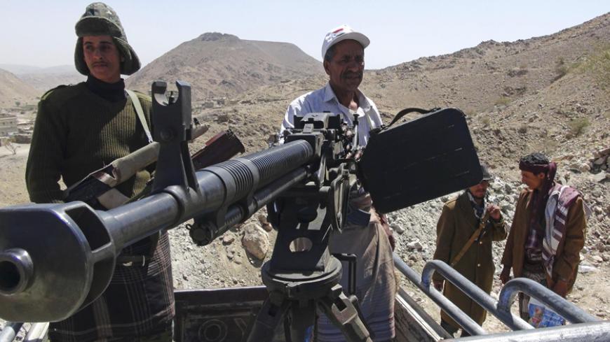 Southern Movement militants man a weapon in the Jabal al-Ierr area of Yemen's southern Lahej province, as they prepare to secure the area against Shi'ite Houthi fighters, March 7, 2015. Most of Yemen has been left without state services or authority, and deadly violence is a daily occurrence as Houthis, state security forces, tribesmen, southern separatists and al Qaeda militants clash with each other.  REUTERS/Stringer (YEMEN - Tags: CIVIL UNREST CONFLICT) - RTR4SG0C