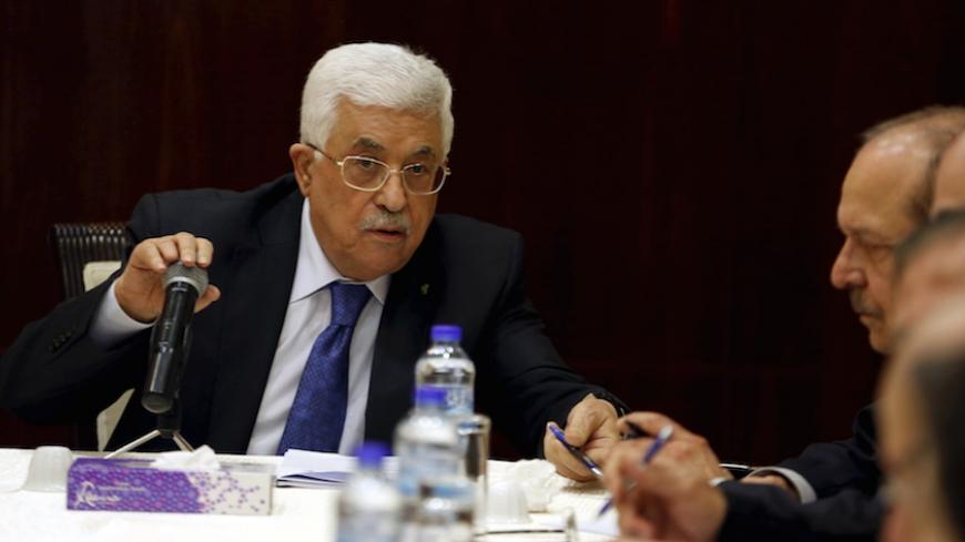 Palestinian President Mahmoud Abbas attends a Palestinian Liberation Organization (PLO) executive committee meeting in the West Bank city of Ramallah March 19, 2015.    REUTERS/Mohamad Torokman - RTR4U0K8