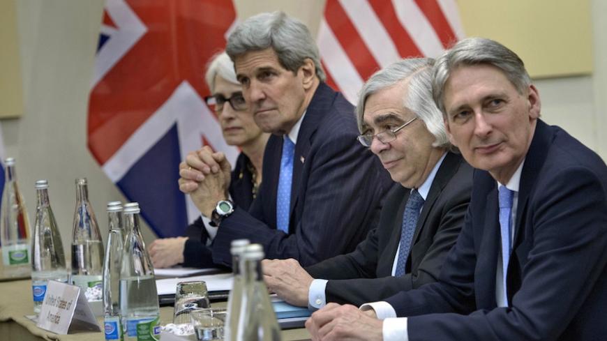 (L-R) U.S. Under Secretary for Political Affairs Wendy Sherman, U.S. Secretary of State John Kerry, U.S. Secretary of Energy Ernest Moniz and British Foreign Secretary Philip Hammond wait for a P5+1 meeting at the Beau Rivage Palace Hotel in Lausanne, Switzerland March 29, 2015. Members of the P5+1 met while in Switzerland for negotiations on Iran's nuclear program.  REUTERS/Brendan Smialowski/Pool  - RTR4VDO4