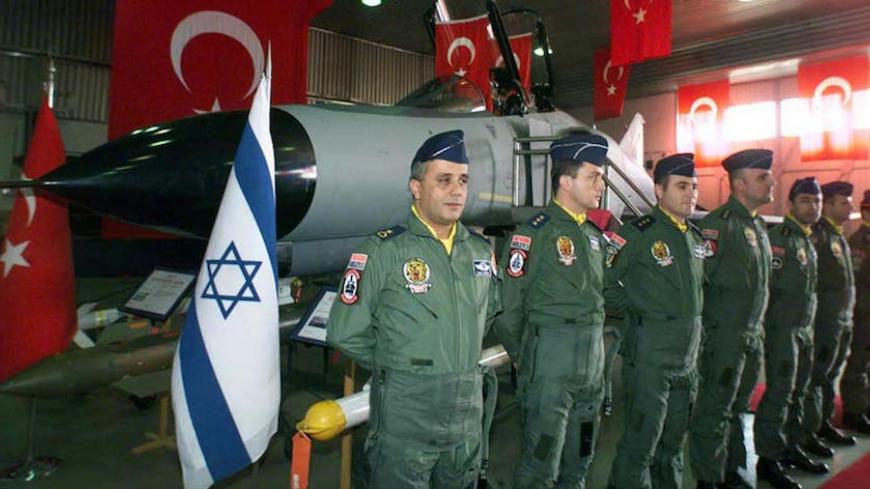 Turkish Air Force pilots stand in front of an F-4 fighter plane flanked by Turkish and Israeli flags during a ceremony for F-4E fighter planes at an air base in western Turkish city of Eskisehir January 27. Two F-4E 2020 planes were handed to Turkish air force during a ceremony in Eskisehir air base after they were modernised by Israeli air force as part of modernization of 54 Turkish F-4E fighter planes.

FS/GB - RTRPBQ