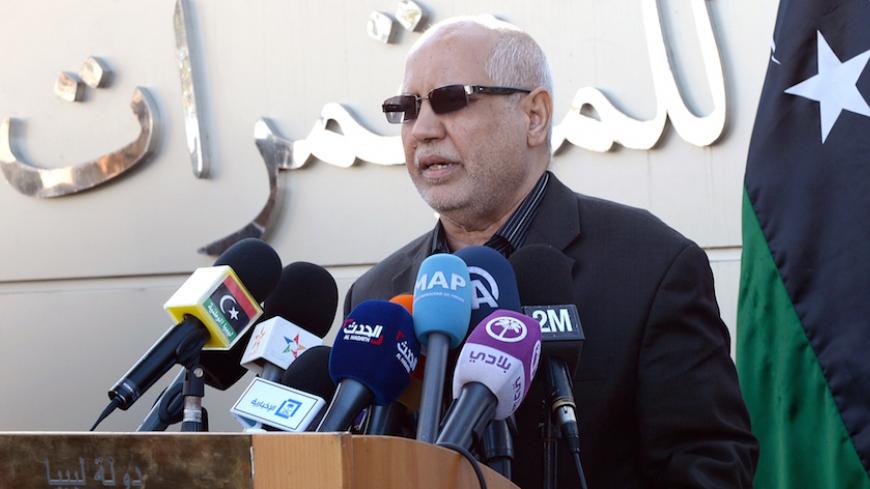 Mohammed Maazab, a Libyan member of the General National Congress (GNC) and head of the talks with the United Nations, adresses journalists on March 12, 2015 in Skhirat, near the Moroccan capital Rabat, where a new round of UN-mediated crisis talks between representatives from Libya's rival parliaments is supposed to start. Libya's internationally recognised parliament which is based in the eastern city of Tobruk confirmed they requested to postpone the start of the talks in Morocco aimed at forming a unity