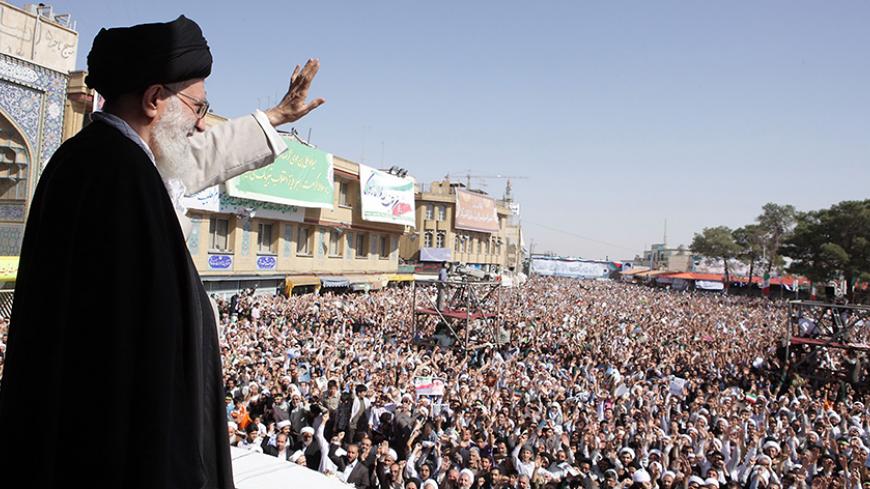 EDITORS' NOTE:  Reuters and other foreign media are subject to Iranian restrictions on their ability to film or take pictures in Tehran.

Iran's Supreme Leader Ayatollah Ali Khamenei waves to the crowd in the holy city of Qom, 120 km (75 miles) south of Tehran, October 19, 2010. REUTERS/Khamenei.ir (IRAN - Tags: POLITICS) THIS IMAGE HAS BEEN SUPPLIED BY A THIRD PARTY. IT IS DISTRIBUTED, EXACTLY AS RECEIVED BY REUTERS, AS A SERVICE TO CLIENTS - RTXTL7O
