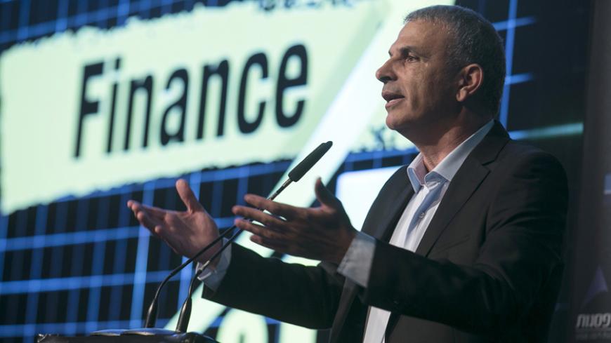Moshe Kahlon, head of the Kulanu party, speaks during a conference in Tel Aviv  March 11, 2015.Israelis will vote in a parliamentary election on March 17, choosing among party lists of candidates to serve in the 120-seat Knesset.
 REUTERS/Baz Ratner (ISRAEL - Tags: POLITICS ELECTIONS) - RTR4SZ53