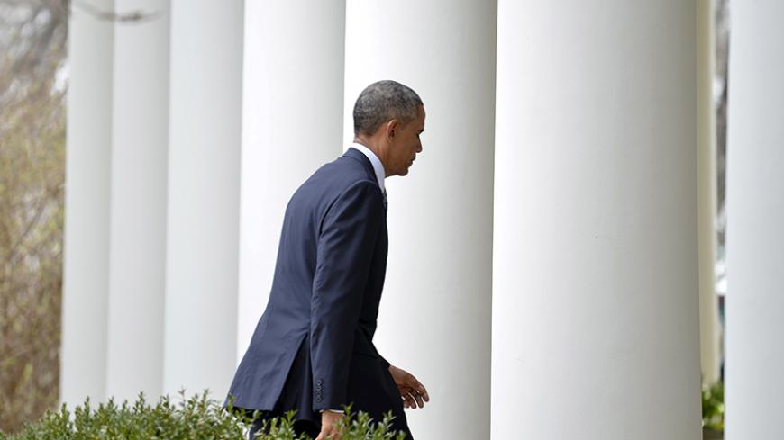 U.S. President Barack Obama walks back to the White House after speaking about the framework agreement on Iran's nuclear program announced by negotiators in Switzerland, in Washington April 2, 2015. Obama on Thursday said a framework agreement reached at talks in Switzerland on Iran's nuclear program is "a good deal" that would, if fully implemented, prevent Tehran from obtaining a nuclear weapon and help make the world safer.   REUTERS/Mike Theiler  - RTR4VXL8