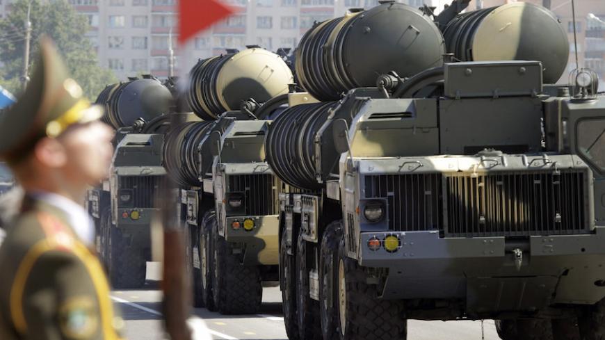 Belarusssian S-300 mobile missile launching systems drive through a military parade during celebrations marking Independence Day in Minsk July 3, 2013.  REUTERS/Vasily Fedosenko (BELARUS - Tags: MILITARY SOCIETY) - RTX11AYI