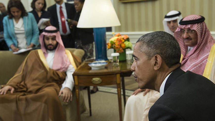 US President Barack Obama meets with Saudi Crown Prince Mohammed bin Nayef (R) and Deputy Crown Prince Mohammed bin Salman (L) in the Oval Office at the White House in Washington, DC, on May 13, 2015.   AFP PHOTO/NICHOLAS KAMM        (Photo credit should read NICHOLAS KAMM/AFP/Getty Images)