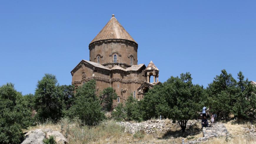 The Church of the Holy Cross, an Armenian church on Akdamar Island in Lake Van, is seen near the eastern Turkish city of Van June 27, 2010. Now a state museum, it has become the latest symbol of the difficult reconciliation between the Armenia and Turkey as the latter prepares to open the site for a one-day religious service next month. Muslim Turkey and Christian Armenia are bitterly divided over their troubled history and the border remains closed despite U.S.-brokered peace accords signed last year. Pict